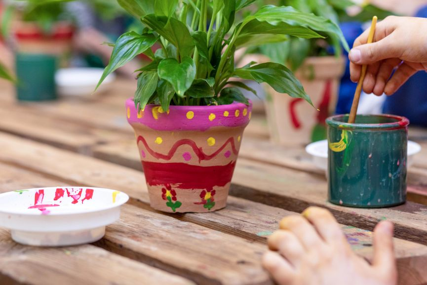 Benefits of Gardening for Kids by Showing their Creativity is Painting Flower Pots